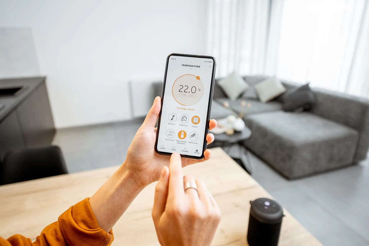 Smart home living room with automated lighting and blinds